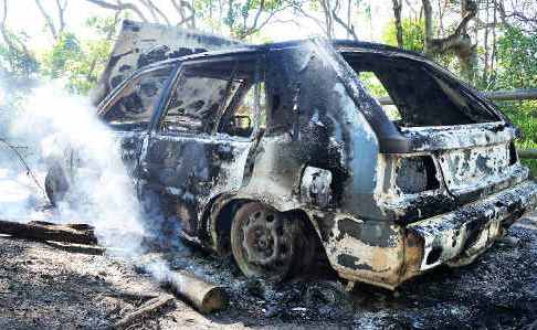 What a mess: Two vehicles have been dumped and torched at Sawtell’s Micks Retreat this week. What a mess: Two vehicles have been dumped and torched at Sawtell’s Micks Retreat this week.